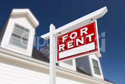 Right Facing For Rent Real Estate Sign In Front of House and Dee