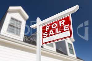 Right Facing For Sale Real Estate Sign In Front of House and Dee