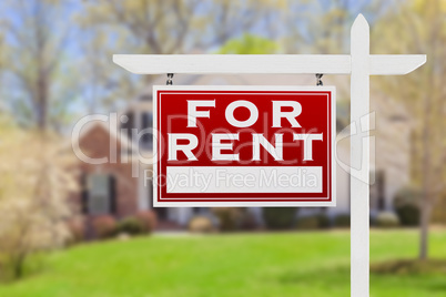 Left Facing For Rent Real Estate Sign In Front of House.