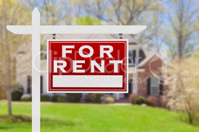 Right Facing For Rent Real Estate Sign In Front of House.