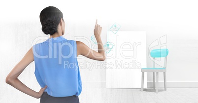 Woman pointing with blank canvas