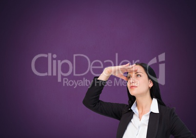 Businesswoman looking with purple background