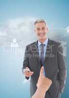 Hand choosing a business man on blue background with blue background
