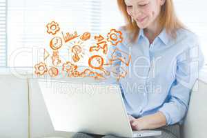 Business woman on computer with graph overlays