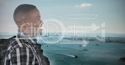 Man looking at city dock with digital interface over head