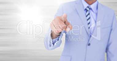 businessman pointing with blue suit