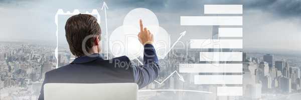 Man touching interface with city backdrop