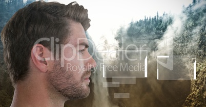 Man looking at interface screens with forest background