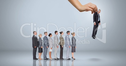 Hand choosing a business man on grey background with business people