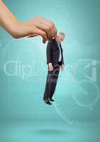 Hand choosing a business man on blue background