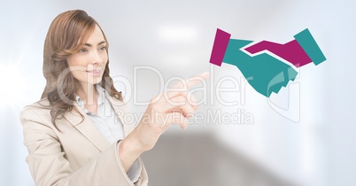 Businesswoman pointing at handshake icon