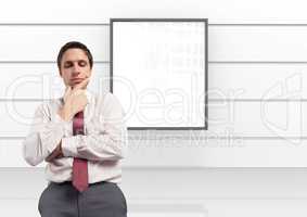 Businessman thinking with board on wall