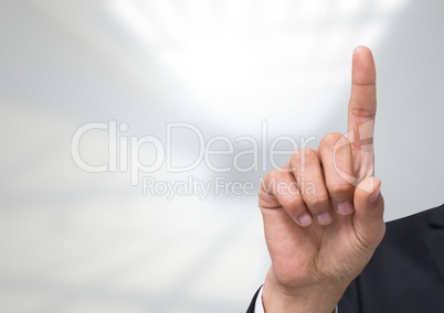 Hand pointing up with bright background