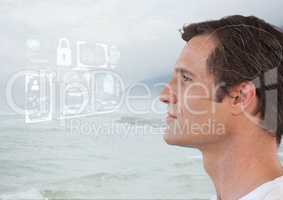 Man looking at interface over sea foam