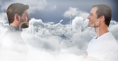 Men looking at each other through clouds