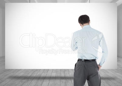 Businessman standing with whiteboard
