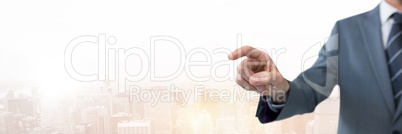 Hand pointing with businessman  over city