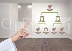 Hand interacting with Business people connected icons on wall