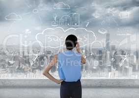 Woman standing looking at success doodle over city