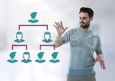 Businessman interacting with business people icons connected