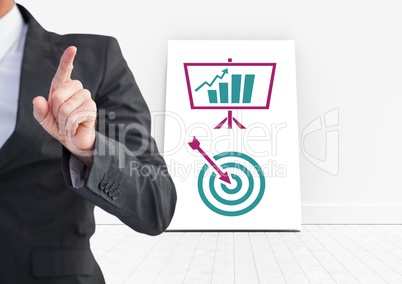 Hand pointing with business icons on white board