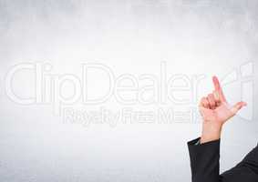 Hand pointing at bright background