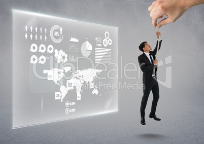 Hand choosing a man with a rope on a grey background with graph
