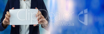 Business person holding blank card in hands