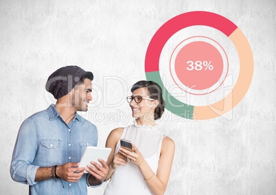 Man and woman holding devices with colorful chart statistics Man and woman holding devices with colorful chart statistics