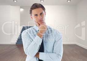 Businessman thinking in room