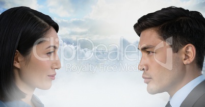 Man and woman looking at each other through clouds