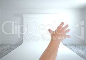 Hand reaching with paper on wall