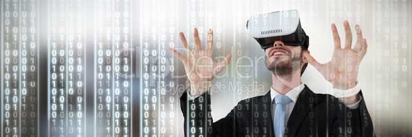 Composite image of businessman with vr glasses gesturing against white background