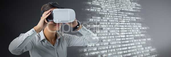 Composite image of female executive using virtual reality headset