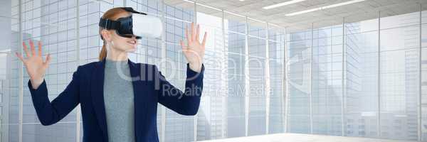Composite image of young businesswoman gesturing while wearing vr glasses