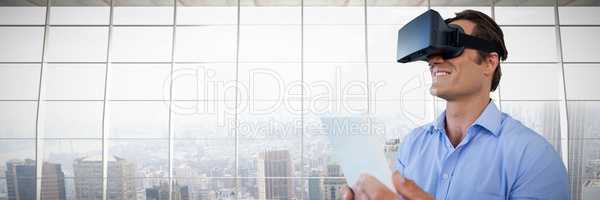 Composite image of close up of businessman with tablet using vr glasses