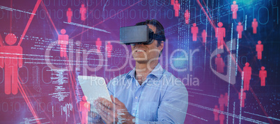 Composite image of businessman with tablet sitting on chair while using vr glasses