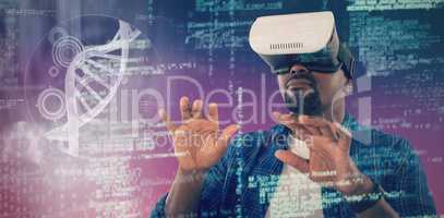 Composite image of man gesturing while using virtual reality headset