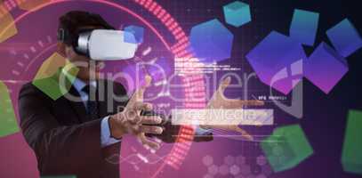 Composite image of smiling businessman gesturing while using vr glasses