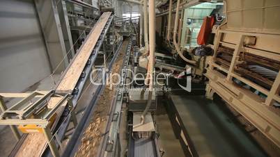 Conveyor belt on factory, Ceramic factory equipment, Transportation of clay on the conveyor, industrial interior, Transportation of raw materials on the conveyor