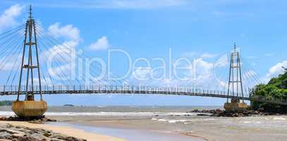 Bridge to the island with a Buddhist temple, Sri Lanka. Wide pho