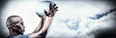 Composite image of athlete in position of throwing rugby ball