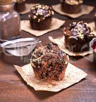 chocolate muffin with a sprinkle of nuts