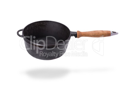 deep old black cast iron frying pan with wooden handle