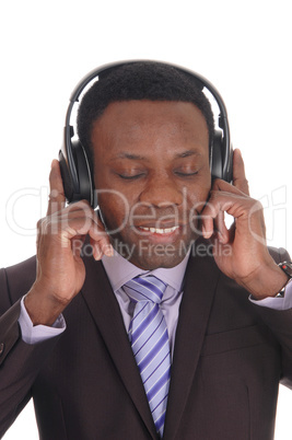 Business man listening to music