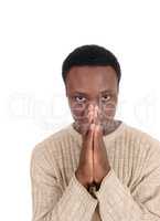 Praying African man in a portrait image