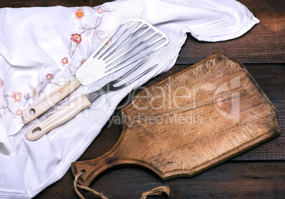 empty kitchen wooden board and kitchen accessories