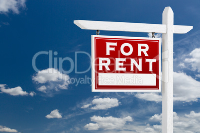 Left Facing For Rent Real Estate Sign Over Blue Sky and Clouds W