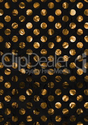 Crumped golden paper background with dotted pattern