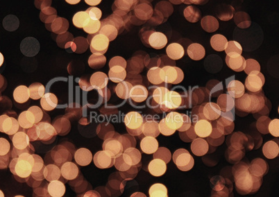 Golden bokeh glittering bright abstract background